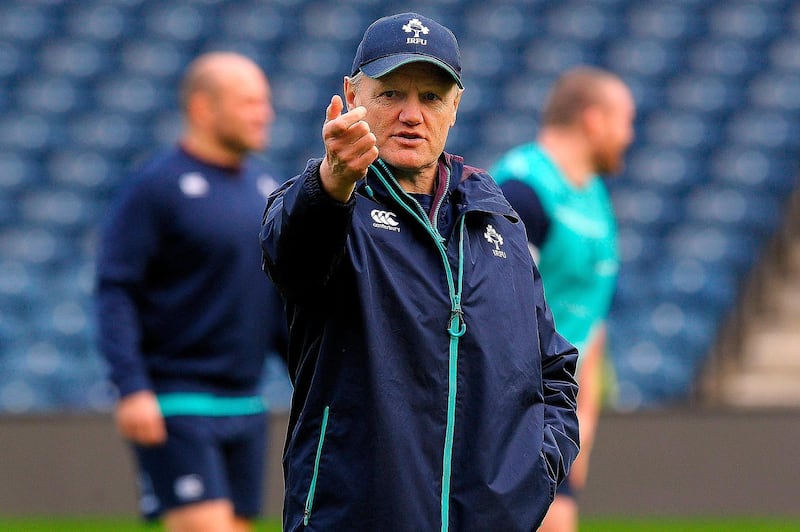 (FILES) In this file photo taken on February 3, 2017 Ireland's New Zealand-born Irish coach Joe Schmidt attends the captain's run training session at Murrayfield Stadium in Edinburgh, on the eve of the Six Nations rugby union match between Scotland and Ireland. 
Eddie Jones and Joe Schmidt face off at Twickenham on March 17, both having engineered turnarounds in the fortunes of the England and Ireland rugby teams since assuming the reins of demoralised outfits. / AFP PHOTO / Andy BUCHANAN