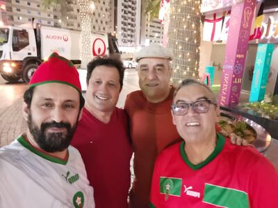 Ahmed Elmalouli, left, with fellow fans after the stunning win over Belgium. Photo: Ahmed Elmalouli