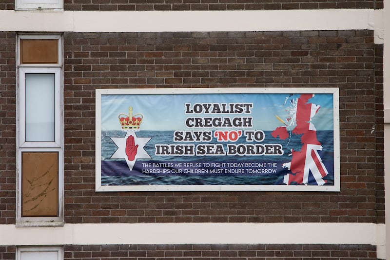 Anti-Irish Sea Border poster is seen on an apartment block pole in the Loyalist Cregagh Road area of east Belfast, County Antrim, Northern Ireland. Photo: Paul McErlane