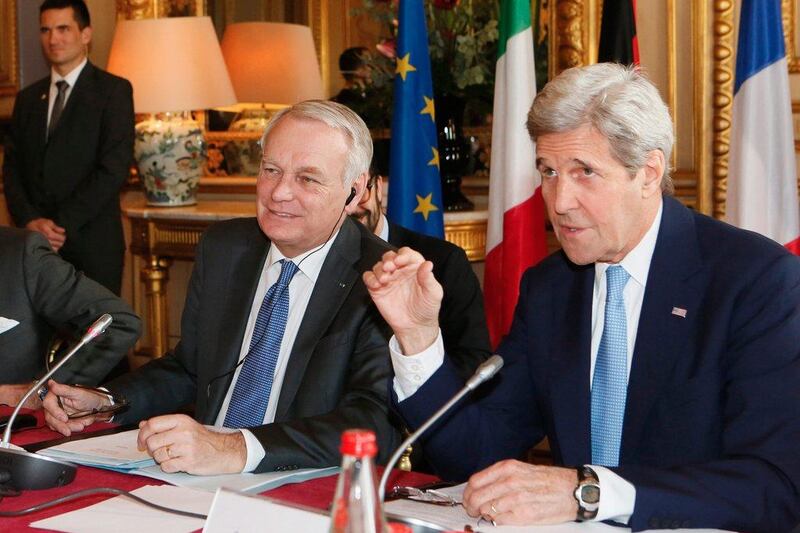 French foreign minister Jean-Marc Ayrault, left, and US secretary of state John Kerry attend a meeting at the Quai d’Orsay ministry in Paris on March 13, 2016. Gonzalo Fuentes / via AP