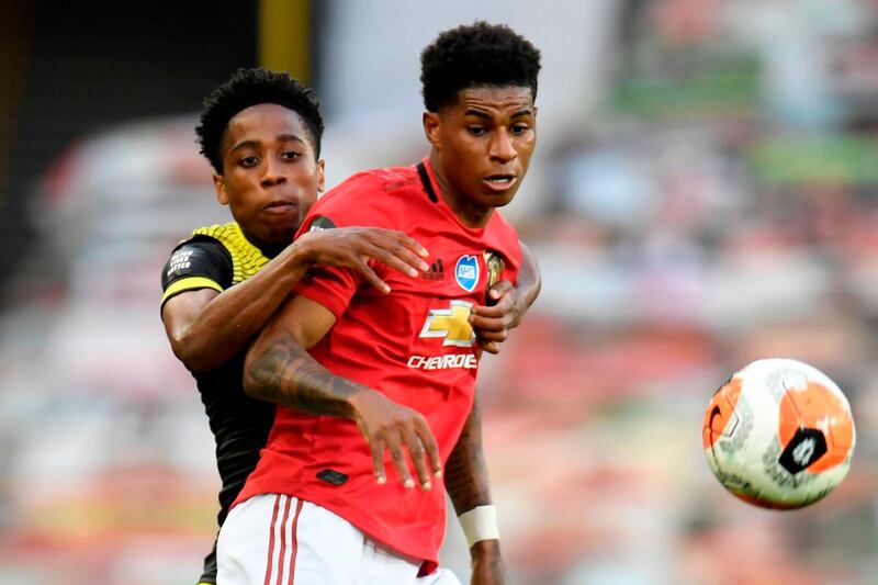 Southampton's Kyle Walker-Peters vies with Manchester United's Marcus Rashford. AFP