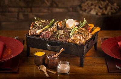 Asado's Parillada Argentina mixed grill can serve up to four and is priced at Dh945. Courtesy Palace Downtown