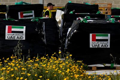 Humanitarian aid is loaded on to pallets in Larnaca, Cyprus, bound for Gaza. AP