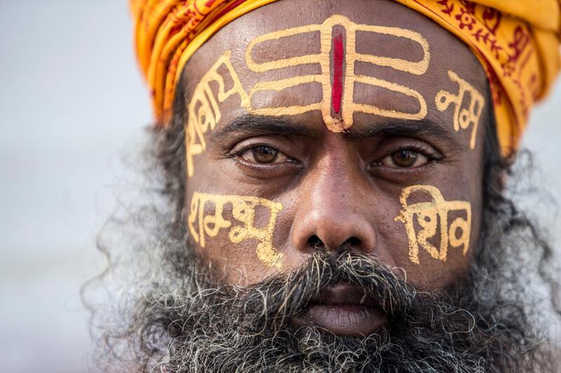 A sadhu, or holy man, performs a ritual at the Pashupati Temple in Kathmandu, Nepal, during celebrations marking the Hindu festival of Maha Shivaratri. EPA