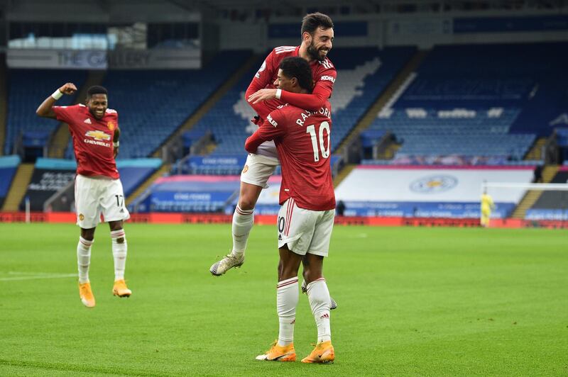 Marcus Rashford celebrates with Bruno Fernandes after scoring the opening goal. EPA