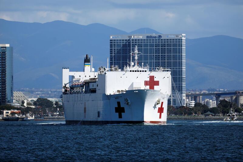 The USNS Mercy, a Navy hospital ship, departs the Naval Station San Diego and heads to the Port of Los Angeles to aid local medical facilities dealing with coronavirus disease patients, in San Diego, California. Reuters