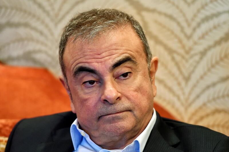epa08891519 Lebanese-French businessman Carlos Ghosn speaks during an interview in Beirut, Lebanon, 16 December 2020 (issued 18 December 2020). Former Nissan chairman Carlos Ghosn on 29 December 2019 fled from Japan where he was on bail and under surveillance in Tokyo awaiting trial on financial misconduct charges.  EPA/WAEL HAMZEH