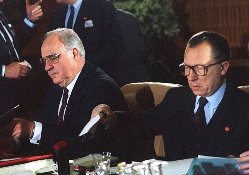 German Chancellor Helmut Kohl and Mr Delors at the opening session of the European Summit in Luxembourg on June 28, 1991. AFP