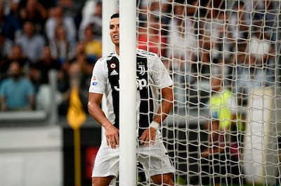 Juventus' Portuguese forward Cristiano Ronaldo stands by Lazio's post after missing a shot during the Italian Serie A football match Juventus vs Lazio on August 25, 2018 at the Allianz Stadium in Turin. (Photo by Filippo MONTEFORTE / AFP)