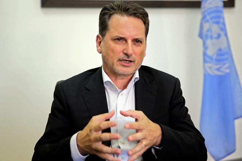 In this Thursday, Aug. 23, 2018 photo, the head of United Nations Relief and Works Agency for Palestine Refugees (UNRWA) Pierre Kraehenbuehl speaks during an interview with The Associated Press in Jerusalem. Kraehenbuehl said Thursday that he believes the U.S. slashed his budget early this year to take out its frustration with the Palestinian Authority but warns that the millions of people served by his organization cannot be wished away. (AP Photo/Mahmoud Illean)