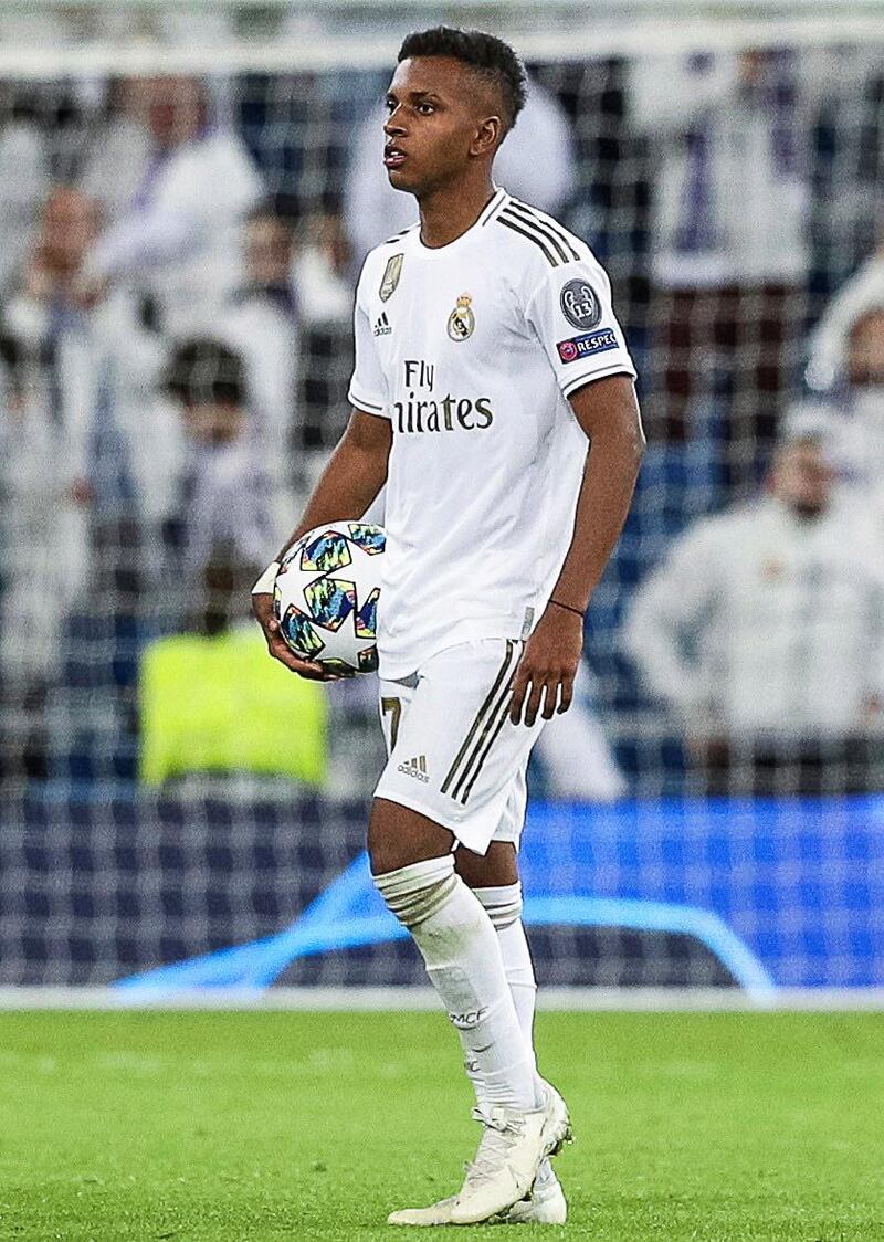 Rodrygo carries the matchball after his 'perfect' hat-trick for Real Madrid. EPA