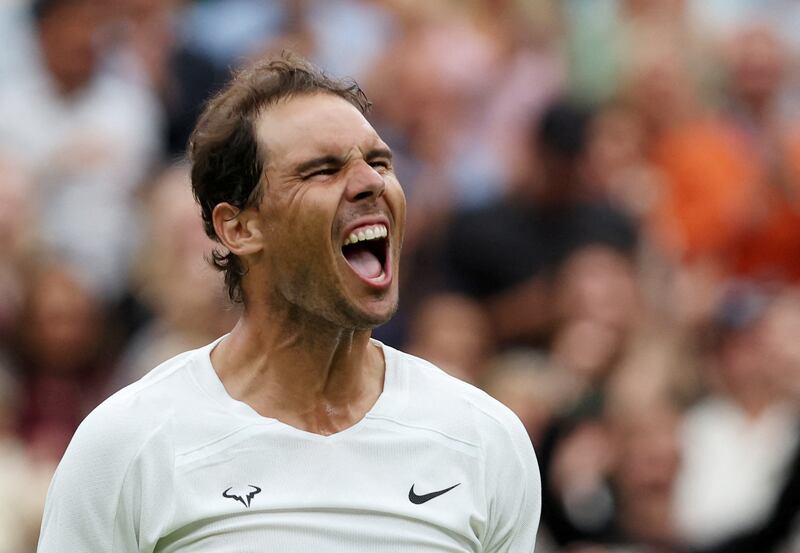 Rafael Nadal celebrates winning his second round match against Lithuania's Ricardas Berankis. Reuters