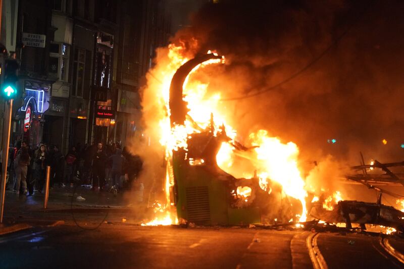 The bus set alight on O'Connell Street. PA