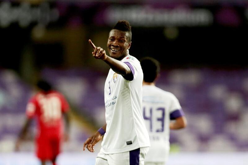 Al Ain's Asamoah Gyan celebrates scoring his second goal against Al Jazira during their Arabian Gulf League match at Hazza bin Zayed stadium in Al Ain on May 1, 2014. Christopher Pike / The National