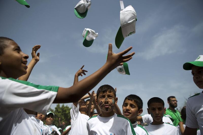 Palestinian children take part in a summer camp organized by Hamas. Mohammed Abed / AFP