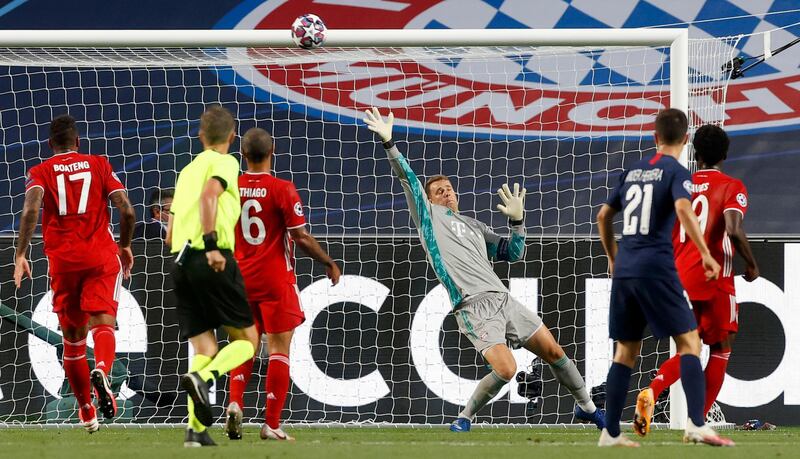 A shot flies over Bayern goalkeeper Manuel Neuer. AP