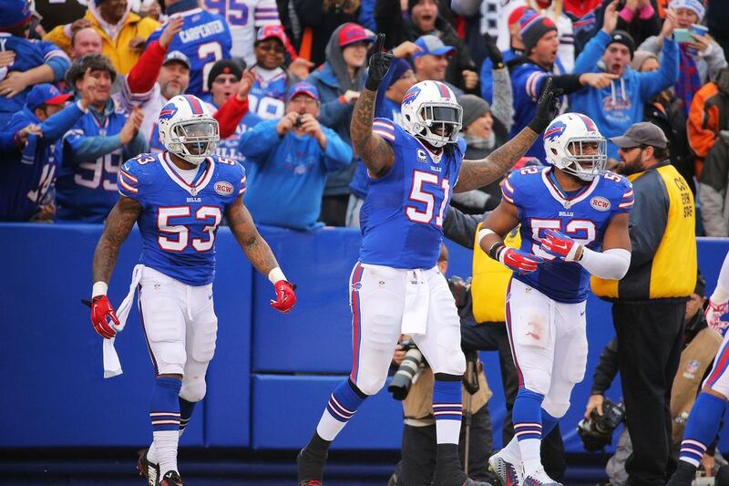 The linebacking corp of Nigel Bradham, left, Brandon Spikes, centre, and Preston Brown have been the strength of the  Buffalo defence. Brett Carlsen / AFP