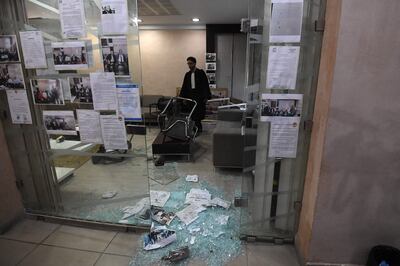 A clean-up at Tunisia’s Lawyers’ Bar headquarters in Tunis after a police raid days earlier. AFP
