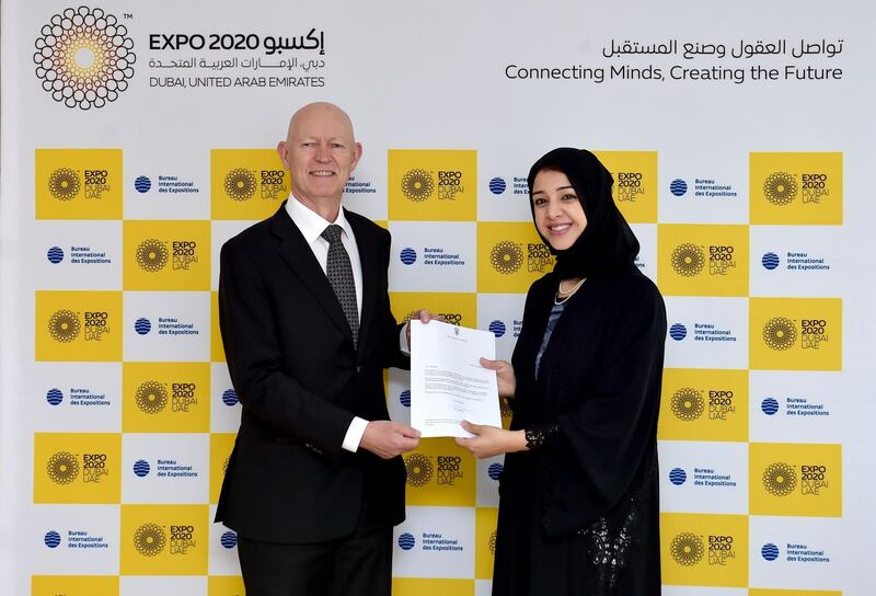 Reem Al Hashimy, UAE Minister of State for International Cooperation and director general of Dubai Expo 2020 Bureau, receives a letter confirming Norway's participation in Expo 2020 from Jens Eikaas, Norway’s Ambassador to the UAE. Courtesy Expo 2020 Dubai