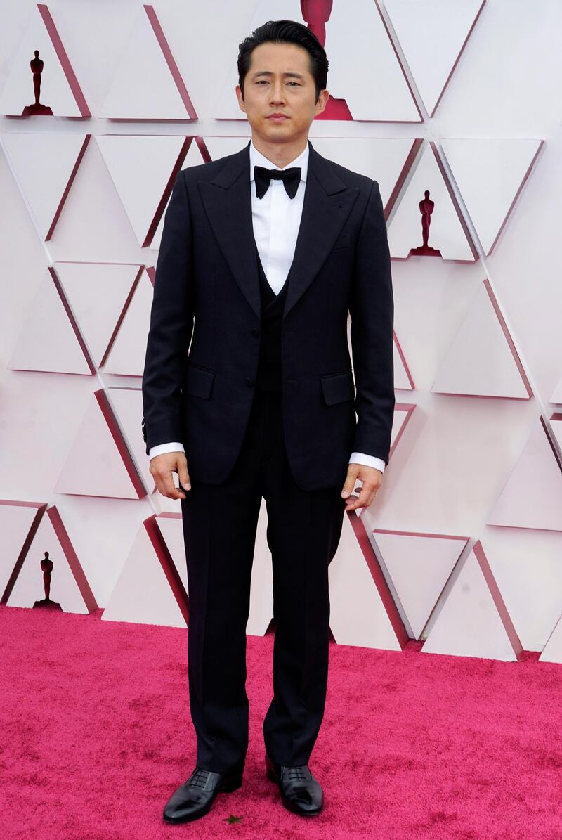 Steven Yeun arrives at the 93rd Academy Awards at Union Station in Los Angeles, California, on April 25, 2021. EPA