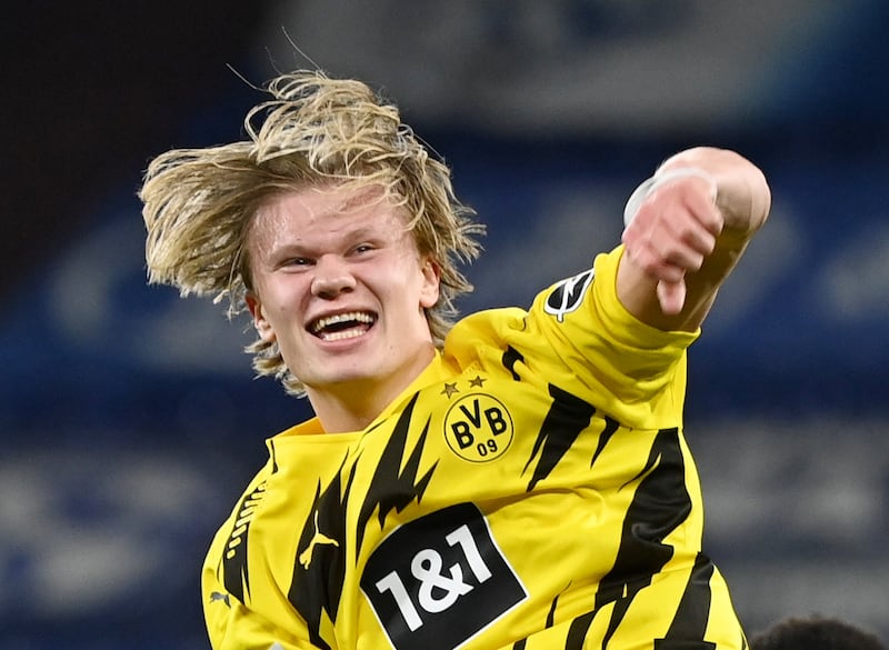 Soccer Football - Bundesliga - Schalke 04 v Borussia Dortmund - Veltins-Arena, Gelsenkirchen, Germany - February 20, 2021 Borussia Dortmund's Erling Braut Haaland celebrates after the match Pool via REUTERS/Ina Fassbender DFL regulations prohibit any use of photographs as image sequences and/or quasi-video.