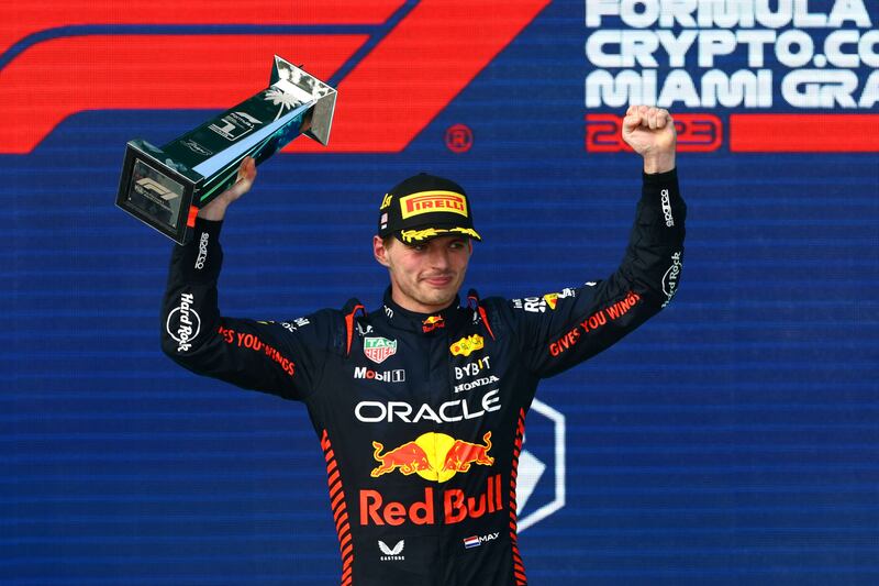 Max Verstappen celebrates celebrates on the podium after winning the Miami Grand Prix at Miami International Autodrome on May 7, 2023. AFP