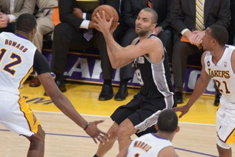 Tony Parker, centre, was the best player for the Spurs against the Lakers in Los Angeles. Joe Klamar / AFP