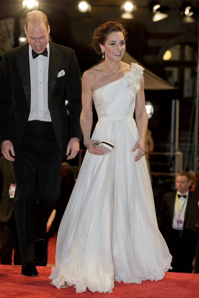 Britain's Prince William and Catherine, Duchess of Cambridge arrive at the 2019 Bafta Awards ceremony at the Royal Albert Hall in London, on February 10, 2019. The Duchess of Cambridge wore an Alexander McQueen gown, Princess Diana's earrings, the Queen's bracelet and Jimmy Choo shoes. Reuters