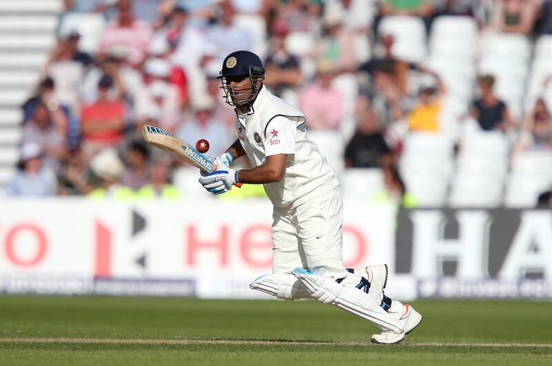 MS Dhoni plays a shot in the Test against England in July. Jan Kruger / Getty Images / July 9, 2014