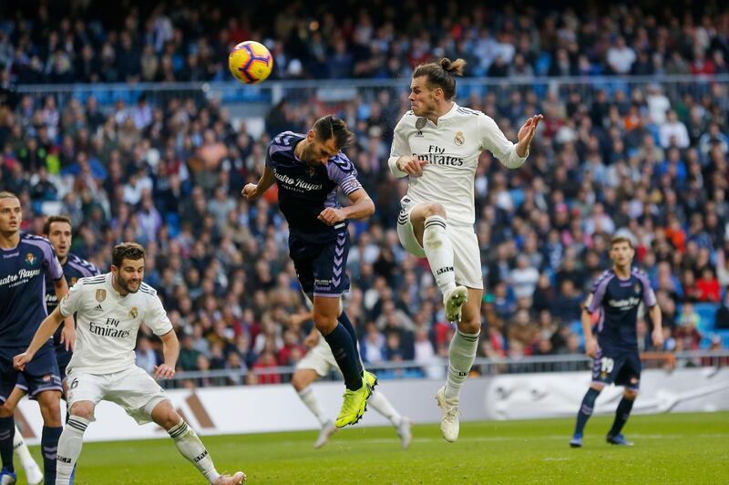 Real Madrid's Gareth Bale heads the ball towards the goal. AP Photo