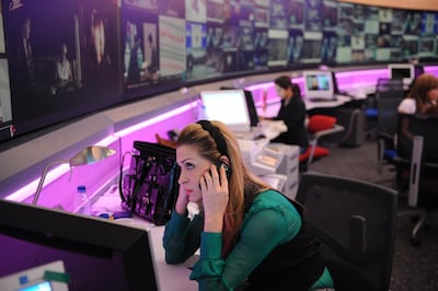 Al-Arabiya TV anchorwoman, Lebanese Najwa Qassem poses at the Arab news channel headquarters, at Dubai Media City, December, 15 2009. almost seven years after its launch from Dubai in the run-up to the US-led invasion of Iraq in 2003, Al-Arabiya remains in tough competition with its older rival, the Qatar-based Al-Jazeera, with each capturing a market share that largely reflects political and ideological divisions in the Arab world, observers say. AFP PHOTO/HO/AMMAR ABD RABBO (Photo by AMMAR ABD RABBO / BALKIS PRESS / AFP)