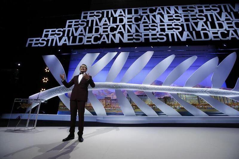 French actor and Master of Ceremony Lambert Wilson delivers a speech during the Closing Ceremony. AFP

