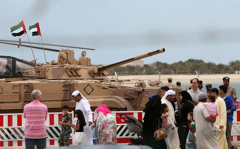 Visitors at the UAE forces exhibition on the corniche in Abu Dhabi. Pawan Singh / The National