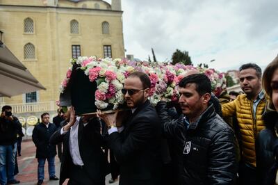 Relatives carry the coffin of Mina Basaran, of the victims of a a plane crash over Iran,  on March 15, 2018 during her funeral cerenomy in Istanbul.
Grieving families bade farewell to the young women killed in a plane crash over Iran while returning from a pre-wedding celebration for a Turkish businessman's daughter, in a tragedy that shocked the country. / AFP PHOTO / YASIN AKGUL