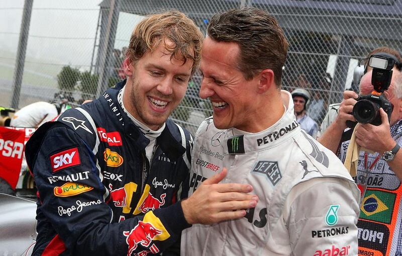 Sebastian Vettel has won three Formula One world championships to Michael Schumacher's seven. Jens Buettner / EPA