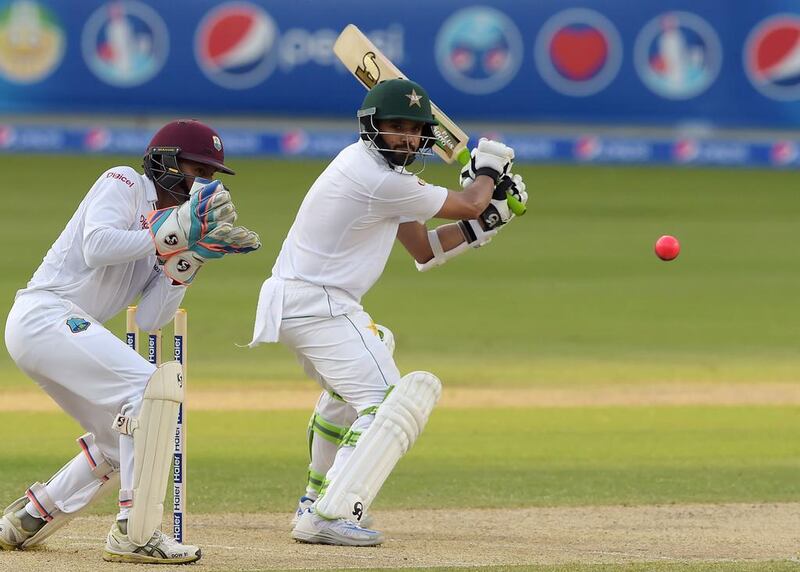Pakistan batsman Azhar Ali, right, became the toast of the nation after scoring a triple century against West Indies in Dubai on Friday night. Aamir Qureshi / AFP