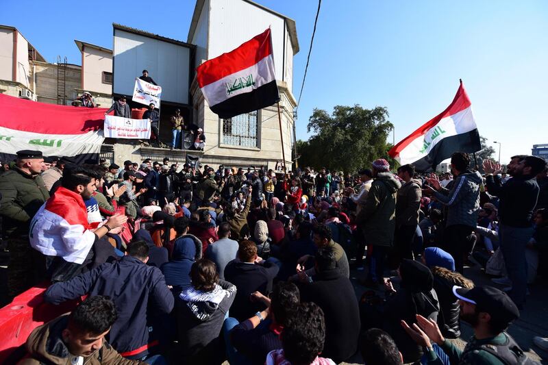 Iraqi university students chant slogans as they take part in a demonstration in front of the Iraqi ministry of higher educations in Baghdad, Iraq, 14 January 2020. EPA