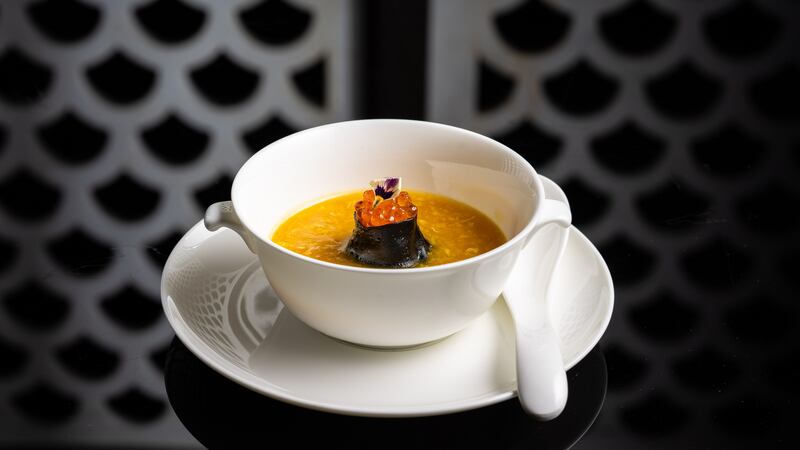 Braised seafood dumpling soup with saffron rice and fish roe from Hakkasan.