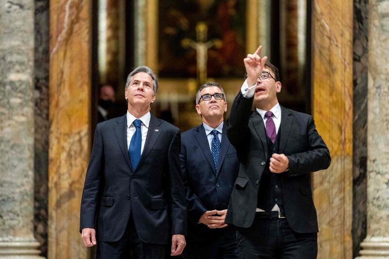 US Secretary of State Antony Blinken and Charge d'Affaires of the US Embassy to the Holy See Patrick Connell visit, with tour guide Alessandro Conforti, the Regia hall, in the Apostolic Palace, at the Vatican, ahead of a meeting with Pope Francis and Archbishop Paul Gallagher, as part of a three-nation tour of Europe. AFP