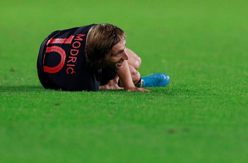 Croatia's Luka Modric down injured. Reuters
