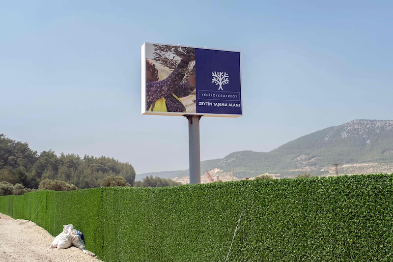 A billboard that states, 'Olive carrying area' erected by the coal-fired Yenikoy power station in Milas, in the south-western Mugla province 