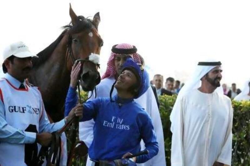 Sheikh Mohammed bin Rashid, right, has had many successes at Meydan Racecourse, including Gamilati, ridden by Frankie Dettori in February.