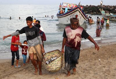 Yemeni fishermen bring ashore their catch in the Khokha district of Hodeidah. AFP