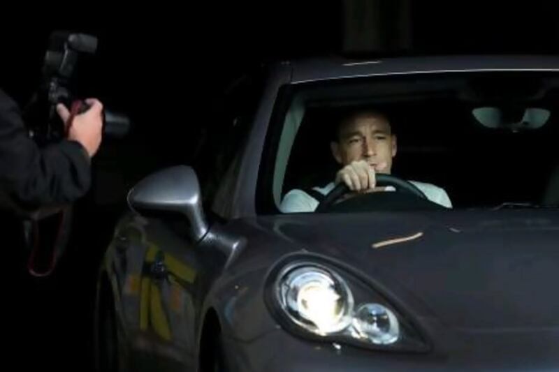 John Terry drives away from Wembley Stadium after an English Football Association disciplinary committee found him guilty of racially abusing Anton Ferdinand, the Queens Park Rangers defender. Matt Dunham / AP Photo