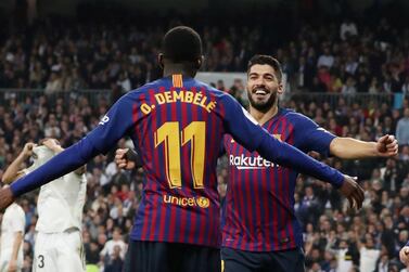 Soccer Football - Copa del Rey - Semi Final Second Leg - Real Madrid v FC Barcelona - Santiago Bernabeu, Madrid, Spain - February 27, 2019 Barcelona's Luis Suarez celebrates their second goal with Ousmane Dembele REUTERS/Susana Vera