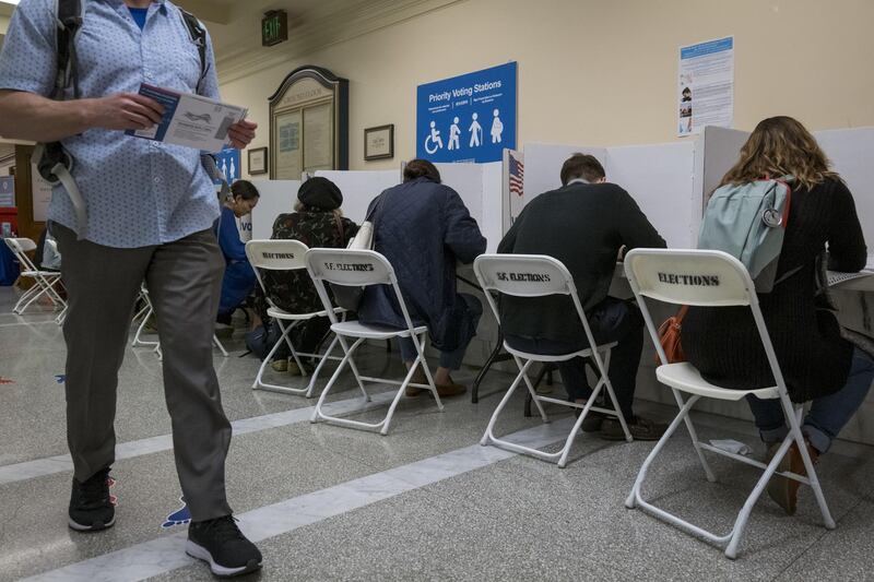 Voters cast ballots at a polling station in San Francisco, California, U.S. Bloomberg