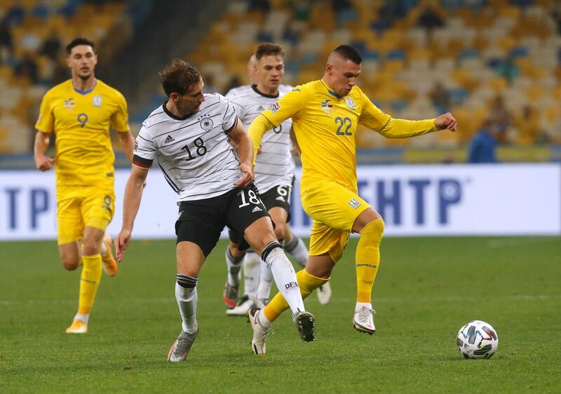 Germany's Leon Goretzka and Ukraine's Oleksandr Zubkov challenge for the ball during the UEFA Nations League match at the Olimpiyskiy Stadium in Kiev. AP