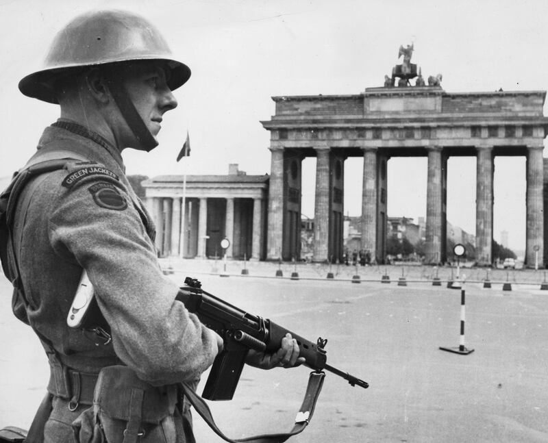 BERLIN - 1961:  (FILE PHOTO)  Saturday, August 13th will celebrate 50 Years Since East German Troops Sealed The Border Between East And West Berlin
Please refer to the following profile on Getty Images Archival for further imagery. 
http://www.gettyimages.co.uk/EditorialImages/News?parentEventId=120436353
and
http://www.gettyimages.co.uk/Search/Search.aspx?EventId=120437101&EditorialProduct=Archival
And Also
In Profile: The Berlin Wall 
http://www.gettyimages.co.uk/Search/Search.aspx?EventId=120436548&EditorialProduct=Archival

A British soldier standing guard in West Berlin, as the East Germans added further restrictions on the crossing of the East-West border in 1961 in Berlin, Germany.  (Photo by Keystone/Getty Images) *** Local Caption ***  3323937.jpg