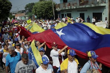 People take part in a rally to commemorate the Day of the Youth and to protest against Venezuelan President Nicolas Maduro's government in Urena, Venezuela. Reuters