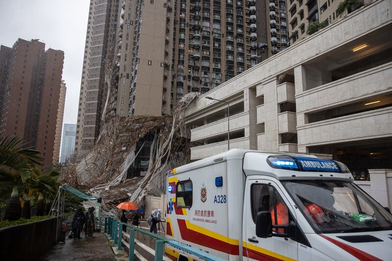 A fire services department ambulance at the site of the collapsed scaffolding in Hong Kong. EPA